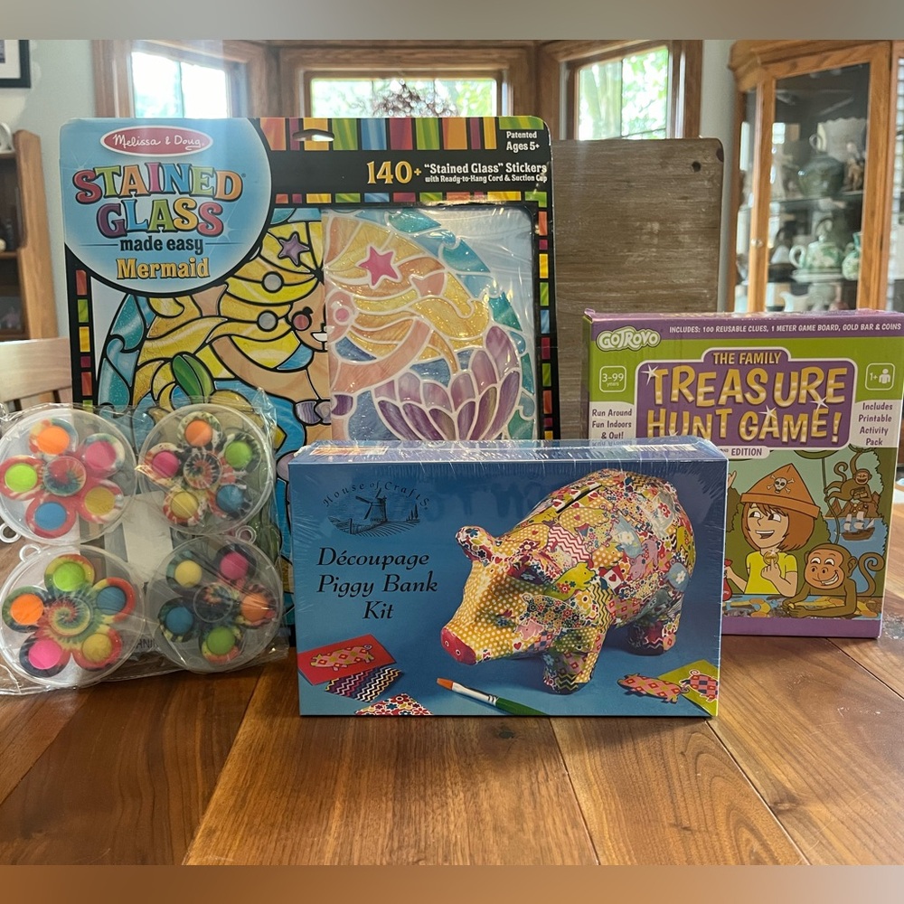 Bundle of Four Toys - New in original packaging.